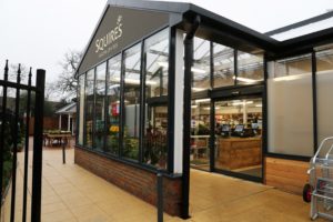 Entrance with signage Squires Chertsey Squire’s Garden Centre in Chertsey opens following rebuild