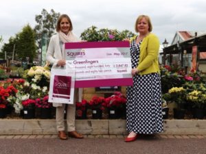 Squires 2 Squire’s donates carrier bag charge proceeds to Greenfingers